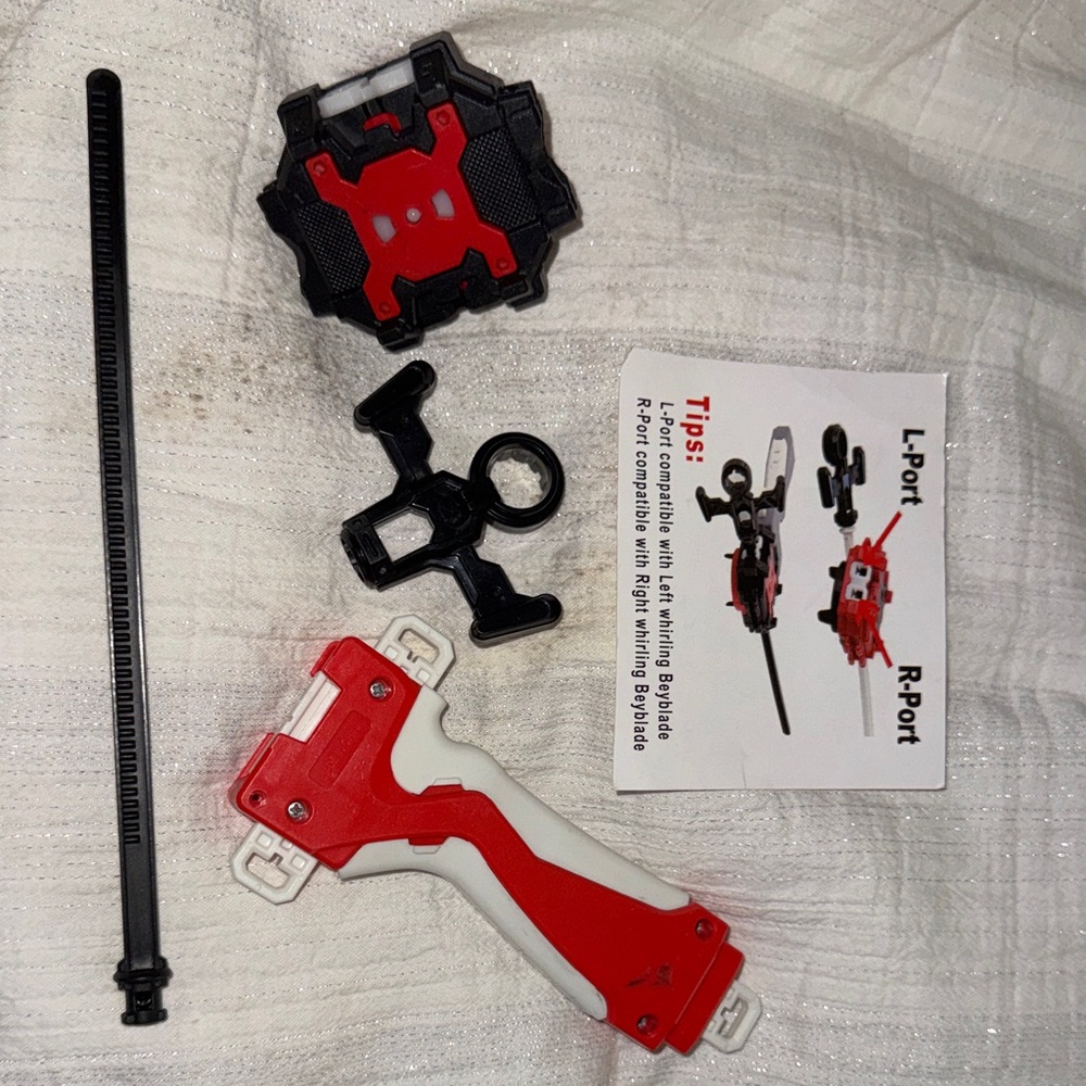 Red and Black Beyblade Battle Burst RipCord Launcher Set